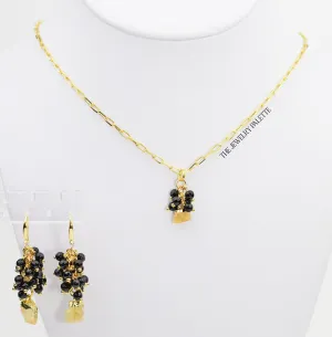 Asna black cluster with gold edged citrine pendant